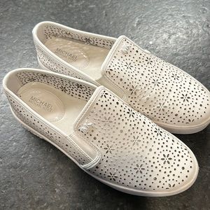 Michael Kors white leather slide on ladies casual sneakers. Size 6.5.